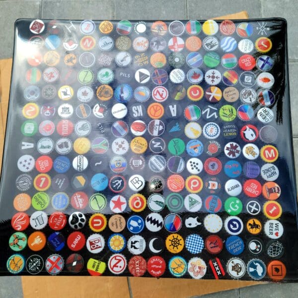 A square glass plate covered in various buttons.