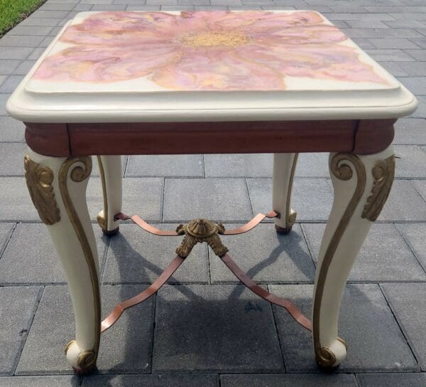 A table with a flower design on it.