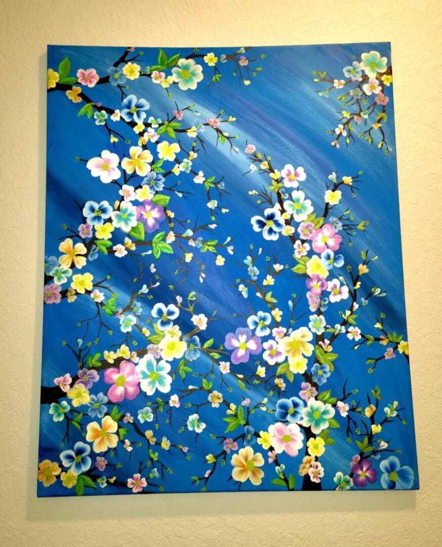 A painting of flowers on the wall
