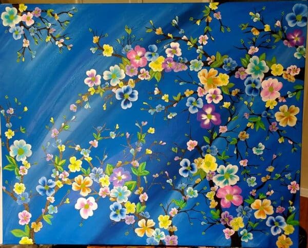 A painting of flowers on the side of a wall.