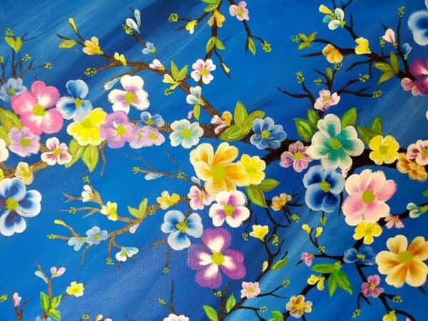 A painting of flowers on a blue background