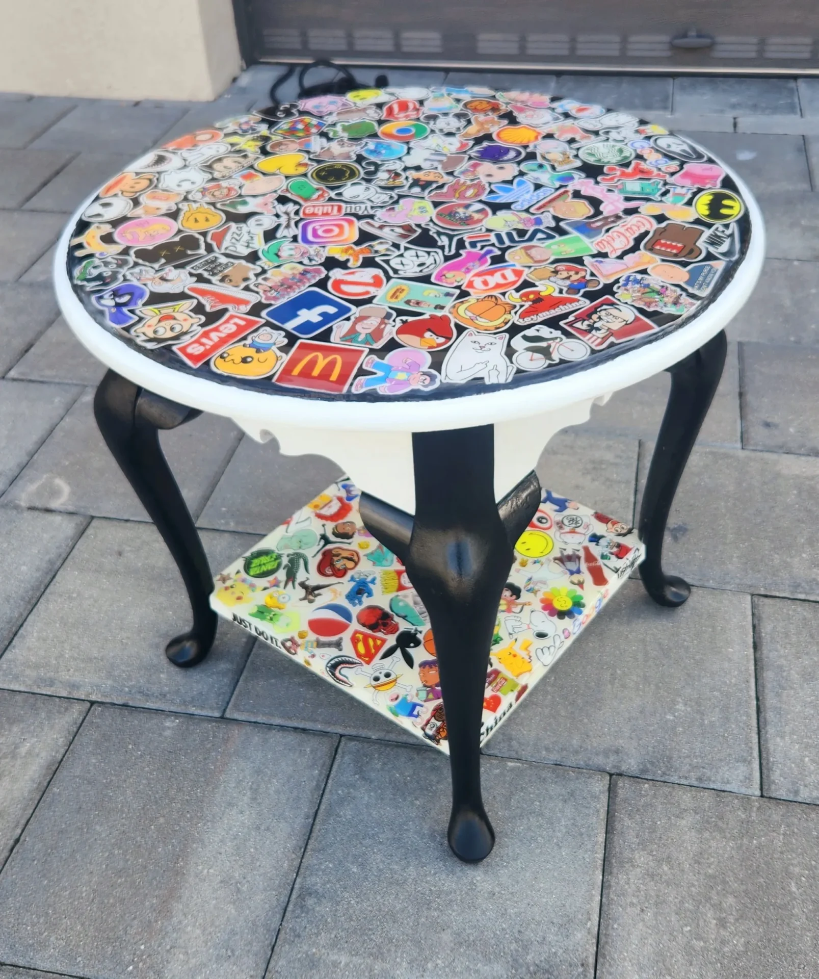 A table with many different stickers on it